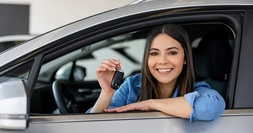 woman in new car